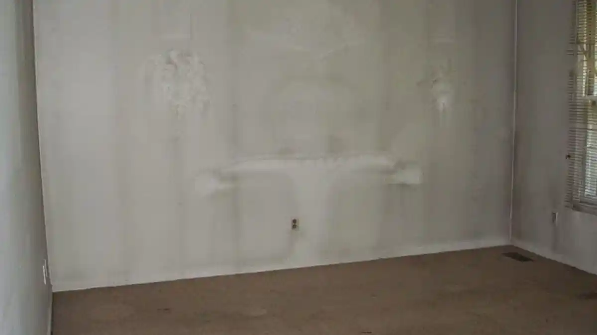 Wall or ceiling with visible soot staining/discoloration from smoke exposure — Smoke Odor Removal in Fairfax, VA